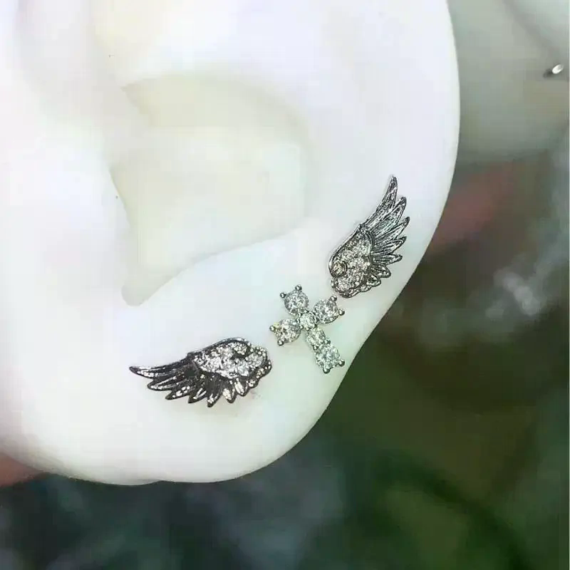 Luxury Lifestyle Jewelry - أقراط على شكل أجنحة ملاك متقاطعة،